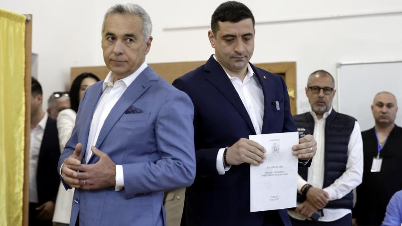 Călin Georgescu refuză să îi pronunțe numele lui George Simion, în primul interviu după alegeri. Îl numește „protejatul meu mai tânăr”
