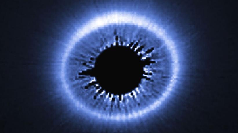 Gheață detectată pentru prima dată în jurul unei stele tinere, asemănătoare Soarelui