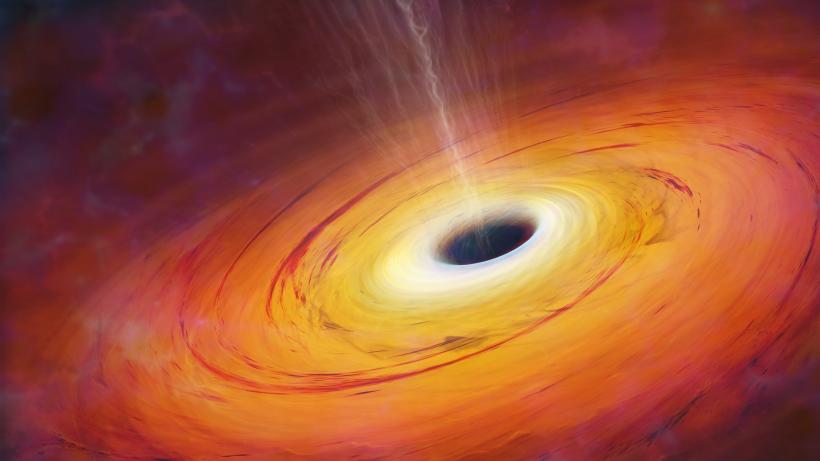 De ce se află o gaură neagră departe de galaxie. Telescopul spaţial al NASA a surprins-o „mâncând” o stea rătăcitoare