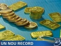 Record istoric. Peste 900 de dolari uncia de aur