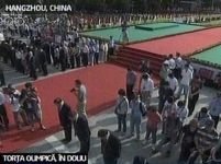 32.000 de morţi în china. Doliu naţional şi traseul torţei olimpice, suspendat