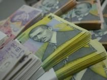 Statul român este dator vândut băncilor