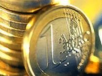 România ar putea adopta moneda Euro în 2015 - cu un an mai târziu decât se estimase