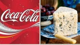 Francezii cer mărirea taxei de import pentru Coca Cola, după ce SUA au sporit taxa pentru brânza Roquefort
