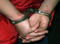 19 români, suspectaţi că ar fi exploatat 27 de compatrioţi, arestaţi în Spania
