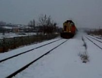 Un voleibalist de 15 ani a murit călcat de tren după ce zăpada ascusese calea ferată