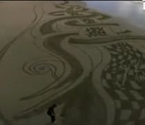 Artă contra cronometru. Peter Donnelly, maestru la desene pe nisip (VIDEO)