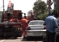 Incident armat, în Capitală: Un poliţist a deschis focul într-o parcare pentru maşini tractate (VIDEO)