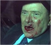 Berlusconi, la prima apariţie în public după atacul de luna trecută
