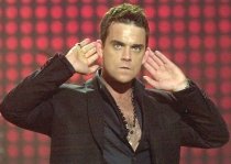 Robbie Williams cântă alături de Take That, după 15 ani