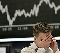 Problemele din zona euro afectează şi bursa SUA, care închide în scădere
