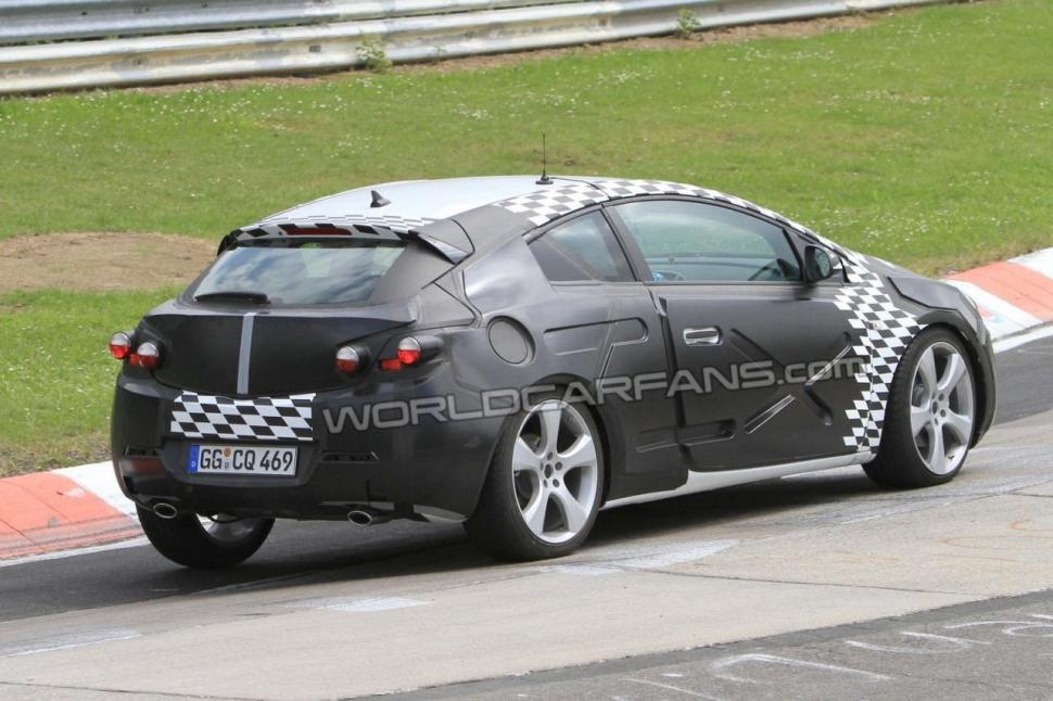 Opel Astra GTC 2011, surprins la teste pe circuitul Nordschleife de la Nürburgring (FOTO) 80039