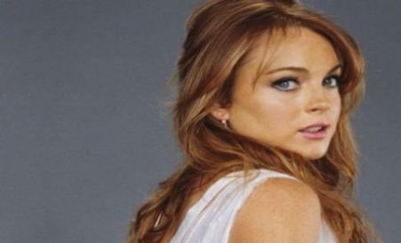 Lindsay Lohan, lovită, de ziua ei, de o chelneriţă geloasă