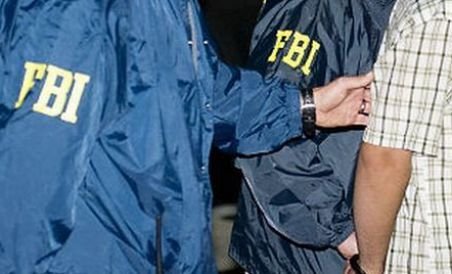 SUA: 24 de români, arestaţi de FBI pentru fraude fiscale 