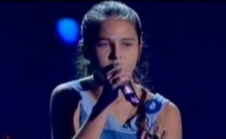 O româncă de 14 ani cu voce excepţională a câştigat concursul italian „Io Canto“