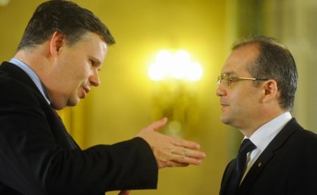 Emil Boc i-a asigurat pe membrii FMI că România poate ieşi din recesiune