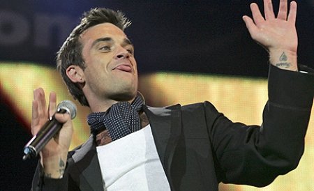 Robbie Williams: Aş fi de acord cu comunismul dacă ar funcţiona fără corupţie