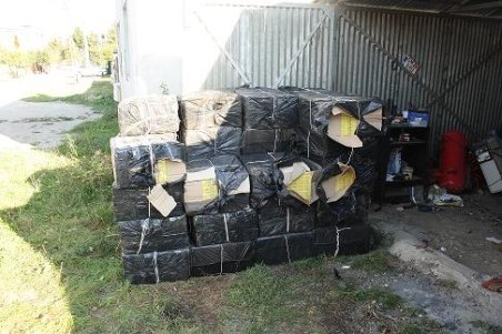 Satu Mare. Un tânăr a fost prins cu 33.500 de pachete de ţigări de contrabandă