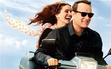 Producătorii ultimului film cu Tom Hanks şi Julia Roberts, amendaţi din cauza unei poze