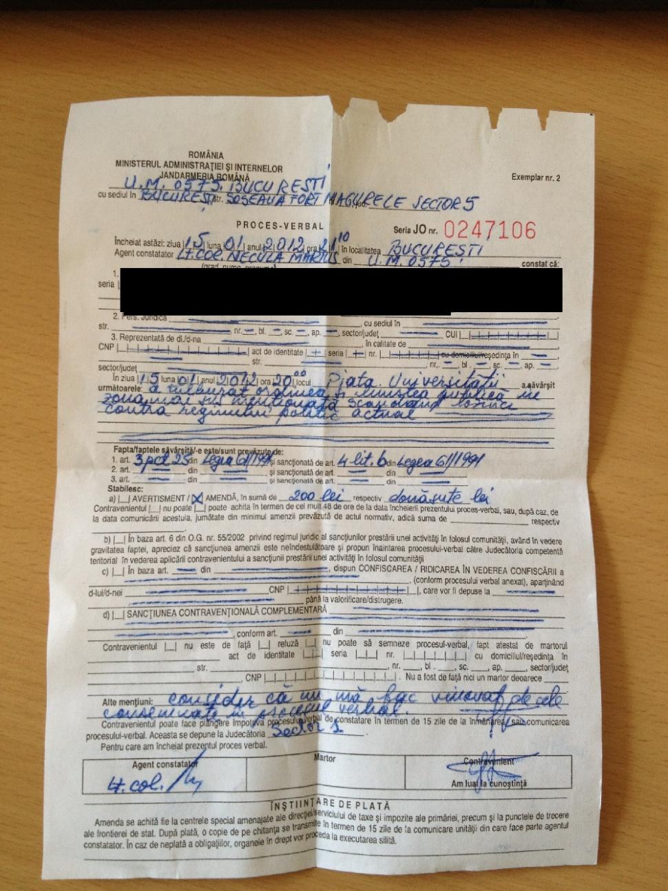 Amendat pentru tulburarea liniştii publice cu lozinci contra regimului actual. Vezi procesul verbal al unui protestatar 126687