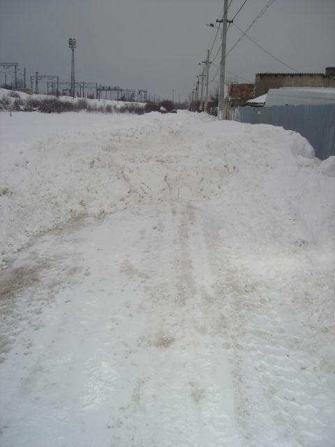 Sectorul 1, Bucureşti: Drumuri blocate de zăpada degajată de utilajele de deszăpezire 128386