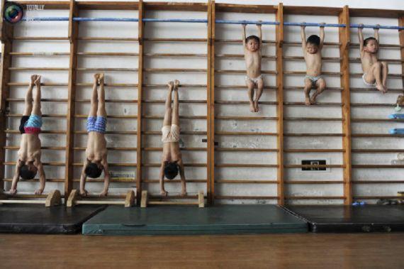 Chinuie copiii pentru faima ţării. Cum se pregătesc chinezii pentru Jocurile Olimpice din 2020 139376