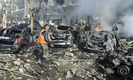 Două explozii succesive au zguduit Damascul. Zeci de morţi şi răniţi, în urma atentatelor