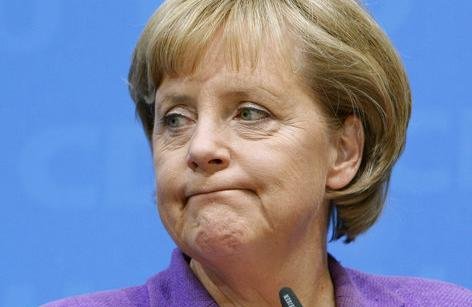 Angela Merkel says suspension of Traian Băsescu &quot;unacceptable&quot;