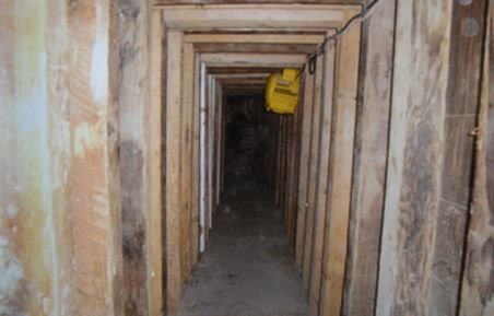 O nouă &quot;rută&quot; pentru traficanţii de persoane - un tunel de 700 de metri, descoperit de poliţişti