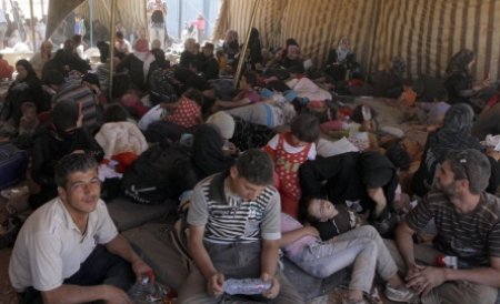 Ministrul elen al Ordinii Publice: Grecia se teme de un val de refugiaţi din Siria