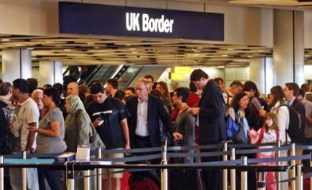 Ministru britanic: Numărul imigranţilor români şi bulgari este irelevant