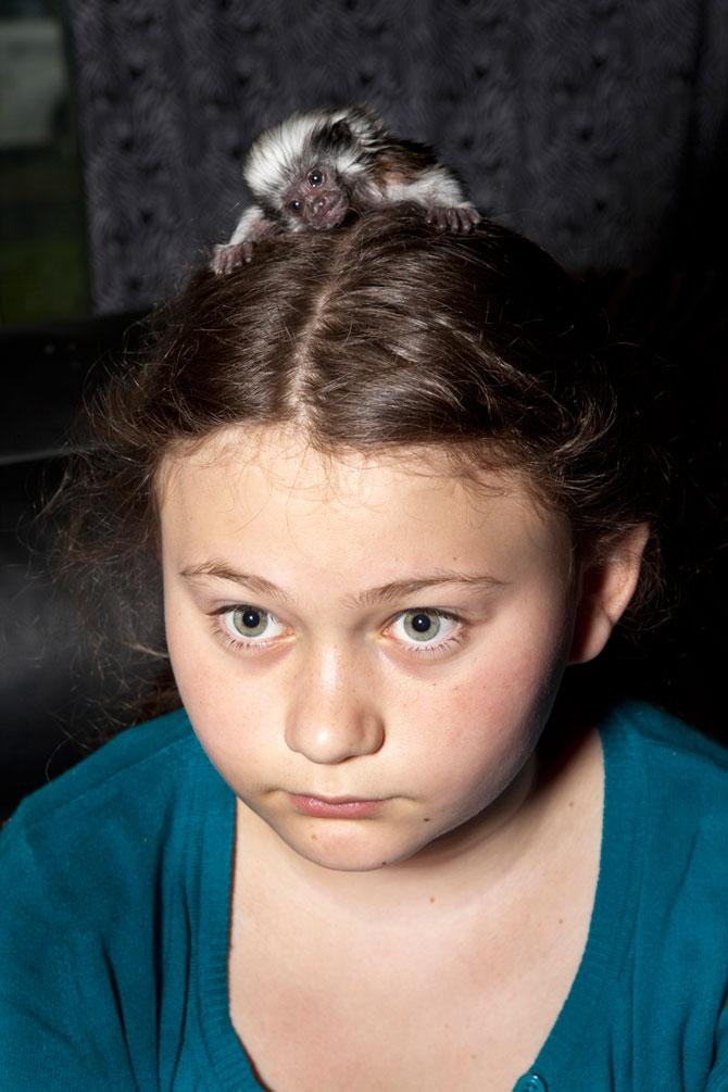 Vezi o galerie foto impresionantă cu fetiţa care iubeşte toate animalele 207088