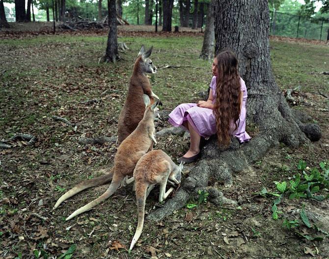 Vezi o galerie foto impresionantă cu fetiţa care iubeşte toate animalele 207091