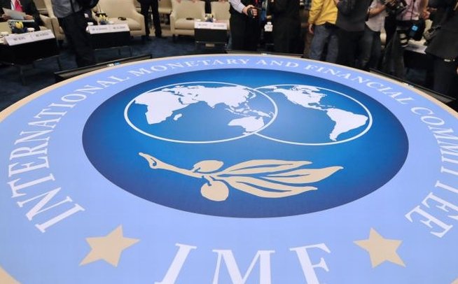 FMI reduce estimările de creştere a economiei americane în 2014
