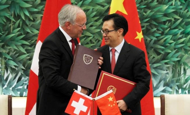 China şi Elveţia au semnat un acord de liber schimb