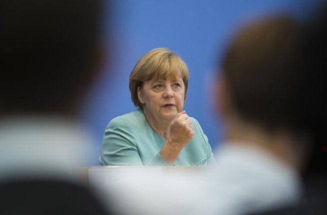 Angela Merkel cere un acord mondial privind protecţia datelor