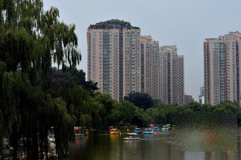 Construcţia care a pus China pe harta celor mai ciudate ţări. "Pe blocul nostru a apărut un MUNTE!" 221459