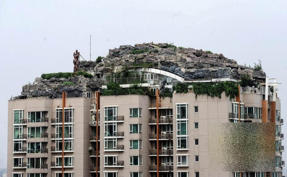 Construcţia care a pus China pe harta celor mai ciudate ţări. "Pe blocul nostru a apărut un MUNTE!" 221460