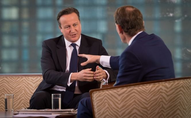 David Cameron: Criza bugetară din SUA, un risc pentru economia mondială