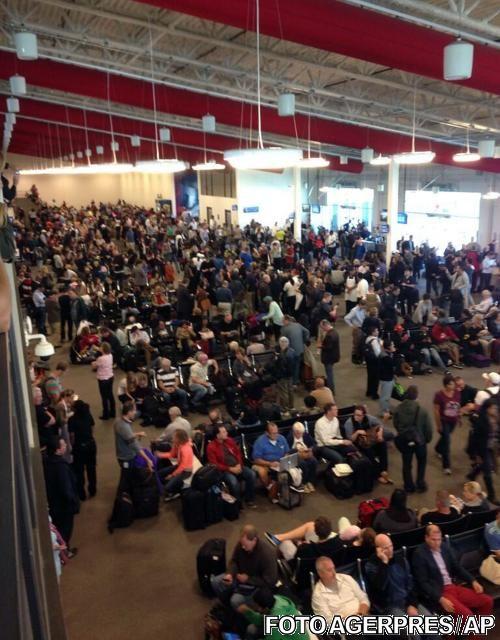 GALERIE FOTO: Atac armat pe aeroportul din Los Angeles. Un ofiţer TSA a fost ucis şi mai multe persoane au fost rănite 233333