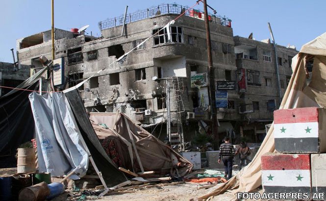 Zeci de militari, printre care patru generali, ucişi într-un atentat cu bombă în apropiere de Damasc