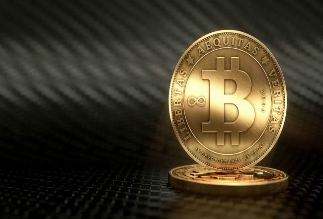 Bitcoin depăşeşte pragul de 1.000 de dolari