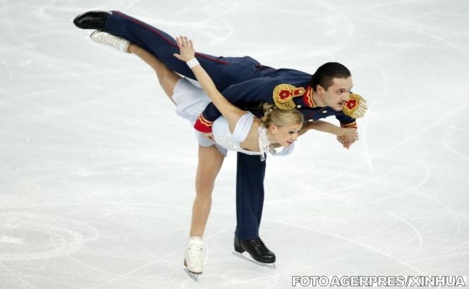 Patinatorii Tatiana Volosozhar şi Maxim Trankov au câştigat la perechi şi au adus al doilea aur al Rusiei la Soci