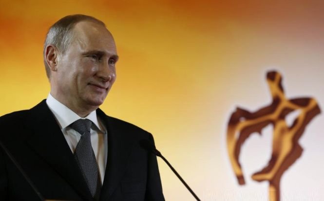 Popularitatea lui Putin a ajuns la un nivel-record, în contextul anexării Crimeei