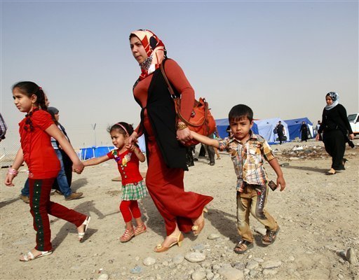 Aproape 40.000 de civili au fugit din oraşele irakiene Tikrit şi Samarra, anunţă OIM