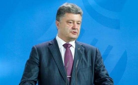 Poroșenko: Decizia lui Putin de a renunța la o intervenție în Ucraina e un prim pas în direcția susținerii planului de pace