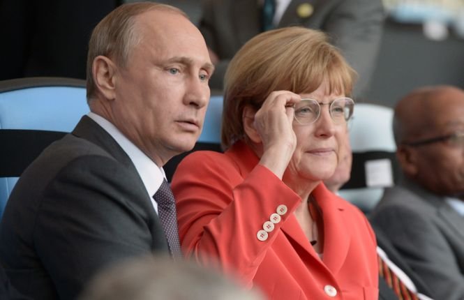 Angela Merkel şi Vladimir Putin vor organizarea unei anchete internaţionale în cazul tragediei aviatice