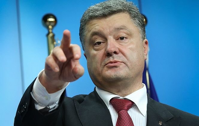 Preşedintele Ucrainei avertizează că va reexamina planul de pace cu rebelii proruşi. Poroşenko: Alegerile sunt o &quot;farsă electorală&quot;