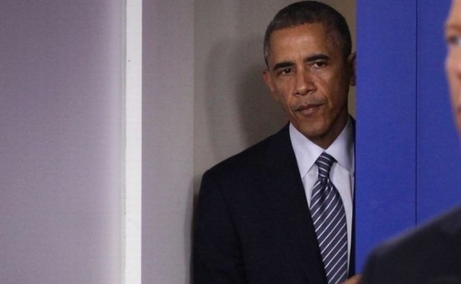 Obama aşteaptă &quot;calmarea situaţiei&quot; pentru a vizita oraşul Ferguson
