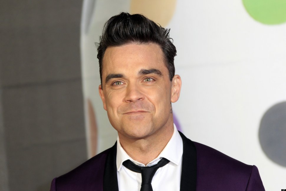 Cântăreţul britanic Robbie Williams vine pentru prima oară în România